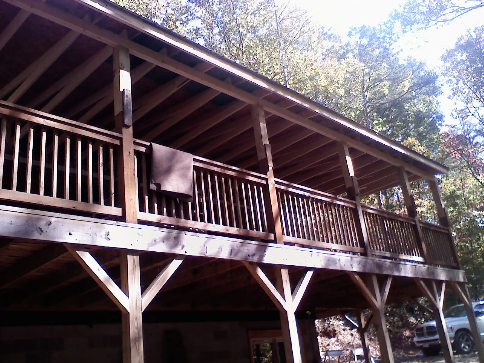 Timber framing under a new elevated porch and deck — Roof Leak Repair in McCammon by Roofing Brothers